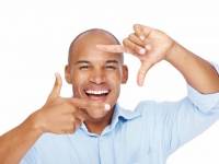 bigstock_Portrait_of_smiling_african_yo_22719539
